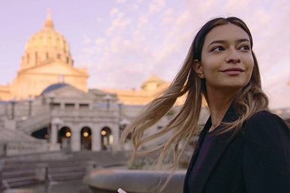 Female near Harrisburg capitol building.