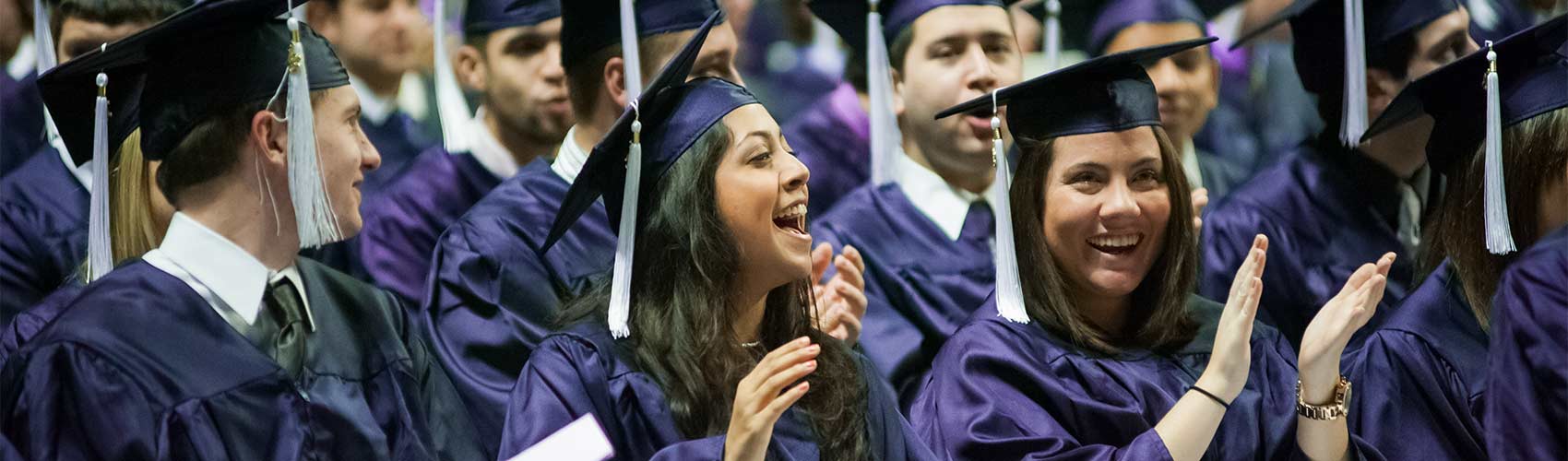 happy graduates at commencement